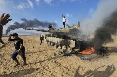 israeli-merkava-tank-attacked-by-hezbollah-drones-in-south-lebanon.jpg Israeli Merkava Tank Attacked by Hezbollah Drones in South Lebanon
